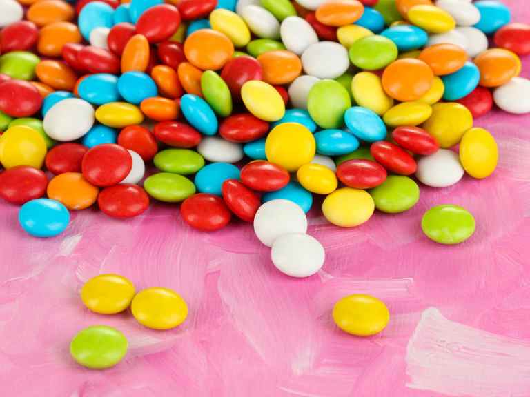 Candy on pink background