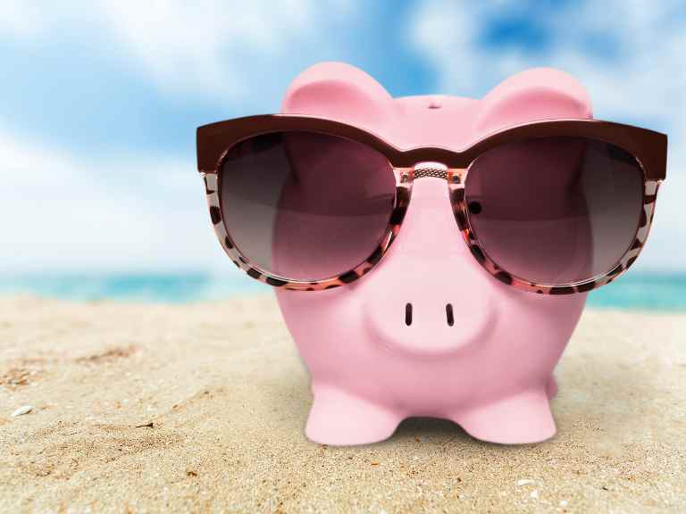 Piggy bank wearing sunglasses