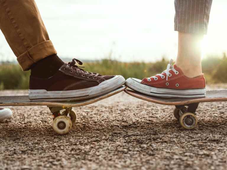 two different shoes on skateboards